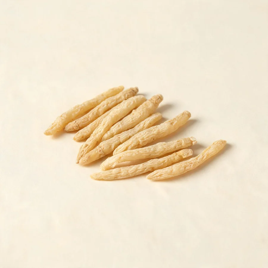 Dried Bei Sha Shen root arranged in a shallow bowl