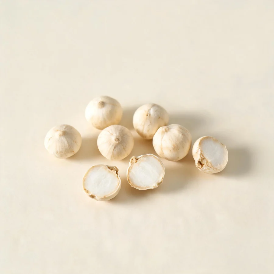 Dried Chuan Bei Mu bulb arranged in a shallow bowl