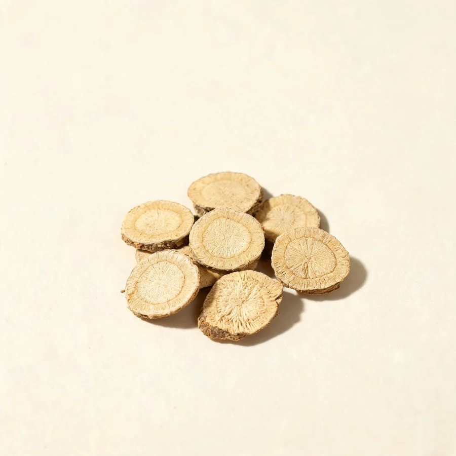 Dried Chuan Niu Xi root arranged in a shallow bowl
