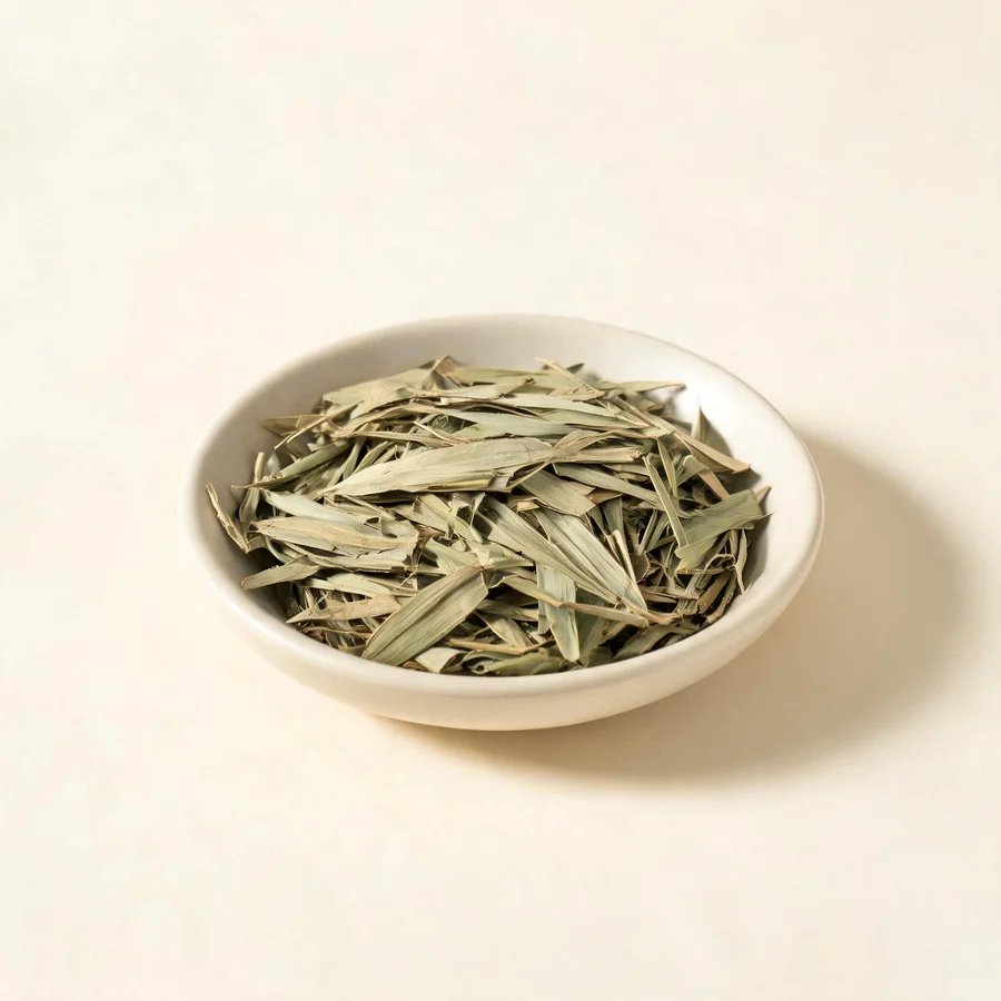 Dried Dan Zhu Ye leaf arranged in a shallow bowl