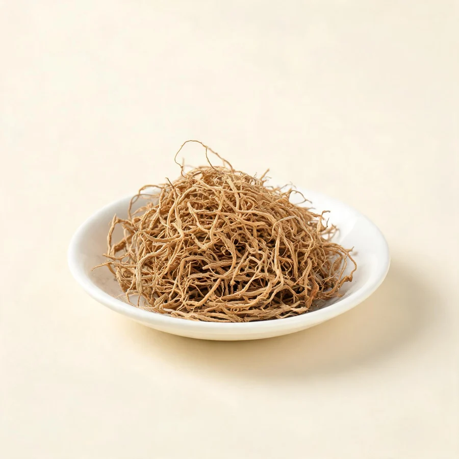 Dried Long Dan Cao root arranged in a shallow bowl