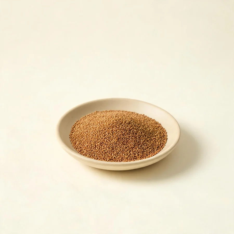 Dried Tu Si Zi seed arranged in a shallow bowl