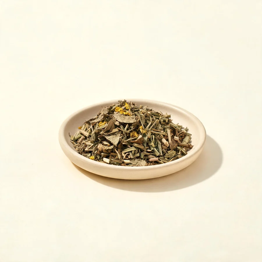 Dried Xian He Cao aerial parts arranged in a shallow bowl